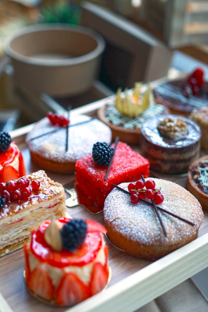 Close-up of assorted gourmet desserts showcasing vibrant colors and intricate details.